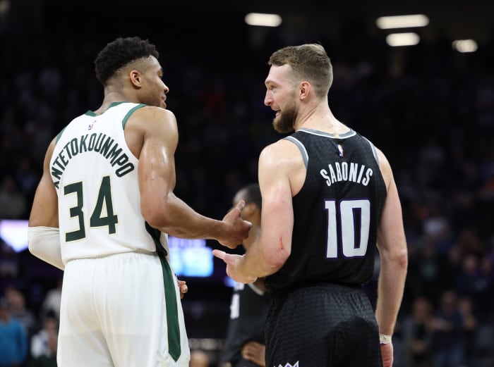 Milwaukee Bucks power forward Giannis Antetokounmpo (34) and Sacramento Kings power forward Domantas Sabonis (10)